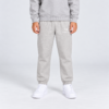 nerva-kids-core-sweatpants-oatmeal-grey-front NERVA Kids Core Sweatpants i ljusgrått, unisex mjukisbyxor för barn, framifrån.