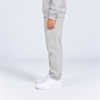 nerva-kids-core-sweatpants-oatmeal-grey-side NERVA Kids Core Sweatpants i ljusgrått, unisex mjukisbyxor för barn, från sidan.
