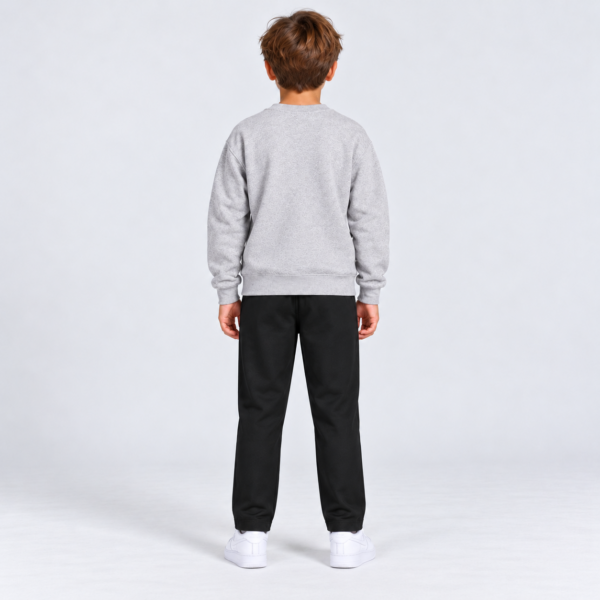 nerva-kids-motion-pants-black-back NERVA Kids Motion Pants i svart, långbyxor för pojke, bakifrån.